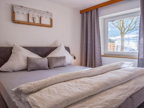 Voodi või voodid majutusasutuse Alpenglück toas