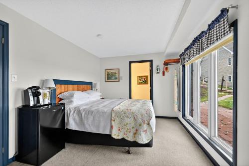 Ένα ή περισσότερα κρεβάτια σε δωμάτιο στο Loyly Spa Guesthouse