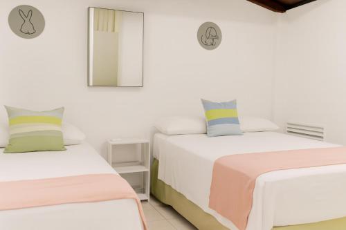 Postel nebo postele na pokoji v ubytování Hospedaje Aldana - Apartamento AMAL zona centro