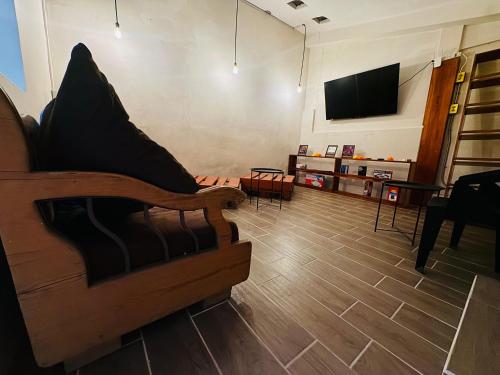 Een TV en/of entertainmentcenter bij Leveli Coliving & Hostel Oaxaca
