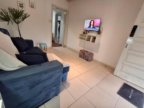 TV a/nebo společenská místnost v ubytování Casa no Centro Livramento - Rivera perto Freeshop