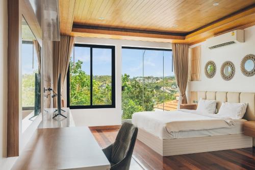 Giường trong phòng chung tại Anara Pool Villa 3 Bedrooms