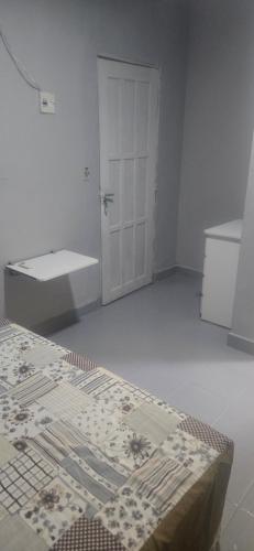 Giường trong phòng chung tại Boa opção