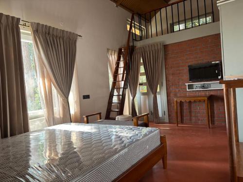 Un televizor și/sau centru de divertisment la Burnside Cottage