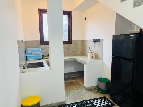 Et badeværelse på Sashini Beach House