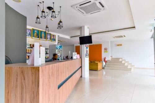 a lobby of a hospital with a reception counter at T Hotel Tandop in Alor Setar