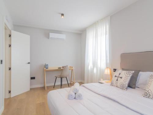 En eller flere senge i et værelse på Apartamento Mar Salada Bocal