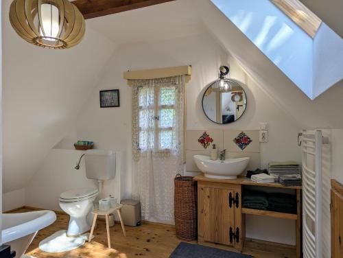 Et badeværelse på The Village Cottage