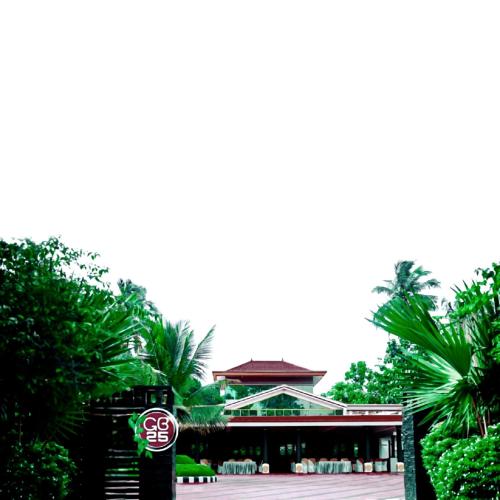 a building with a stop sign in front of it at GB25 inn in Trivandrum