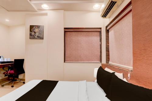 Postel nebo postele na pokoji v ubytování Townhouse Oak Ramdaspeth Downtown