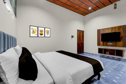 Кровать или кровати в номере Mithalai Farm by Palette I Kids's Play I Breakfast | Coimbatore