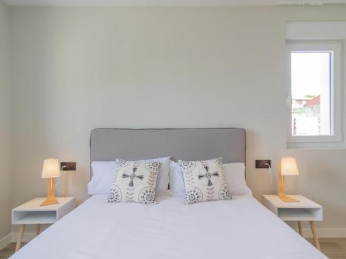 En eller flere senge i et værelse på Apartamento Mar Salada Piquel