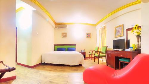 TV a/nebo společenská místnost v ubytování Juliana Hotel Colombo 03