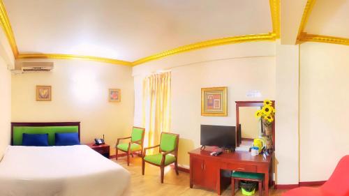 Postel nebo postele na pokoji v ubytování Juliana Hotel Colombo 03