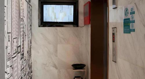 Ένα μπάνιο στο City Comfort Inn Tianmen Luyu Food Street