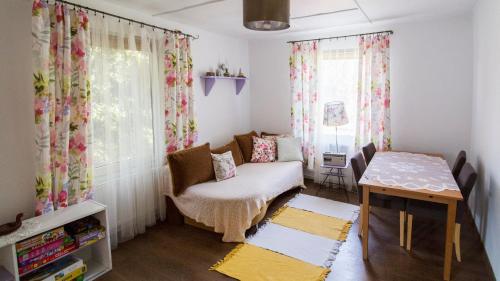 Un pat sau paturi într-o cameră la Siedlisko Józefka