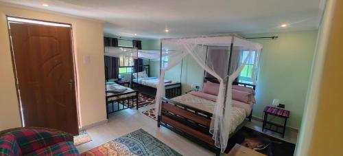 Una cama o camas en una habitación de Greenwood safari camp