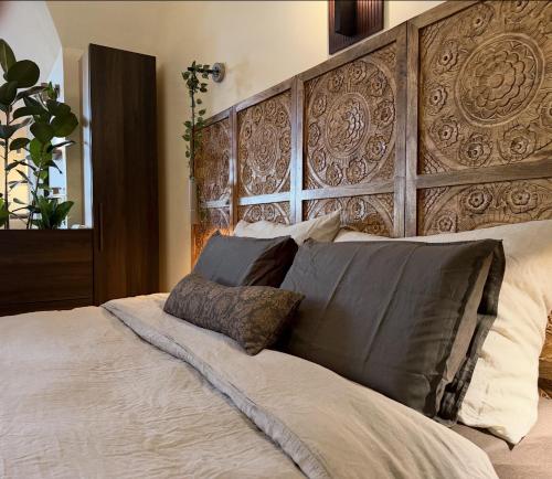 En eller flere senge i et værelse på Loft architecte exceptionnel avec mini piscine design