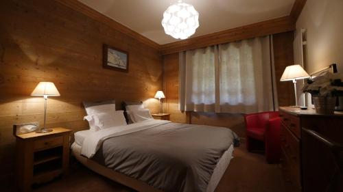 Lova arba lovos apgyvendinimo įstaigoje Chalet Les Alpes