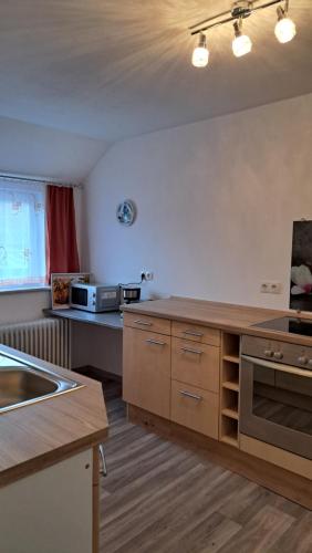 Kuchyň nebo kuchyňský kout v ubytování Ferienwohnung Auguste