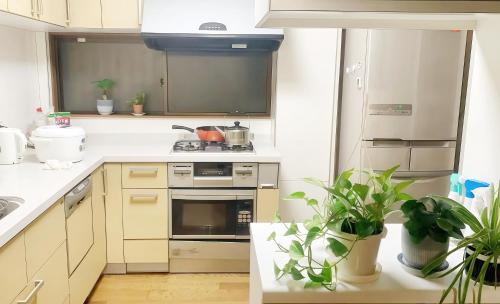 Η κουζίνα ή μικρή κουζίνα στο 烟雨轩 202