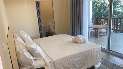 Giường trong phòng chung tại Vista Alta Serma