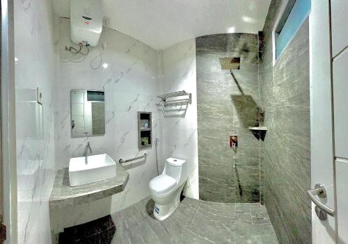 Koupelna v ubytování studio suryajingga