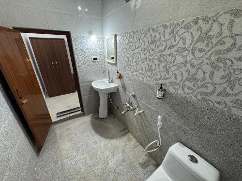 Phòng tắm tại Manuvan Estate Stay