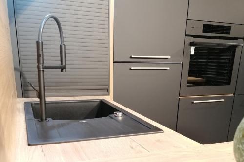 Kuchyň nebo kuchyňský kout v ubytování Bayerwald Chalet Liebenstein