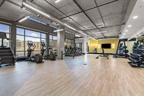 a gym with treadmills and cardio equipment in a building at Kasa Rino Denver in Denver