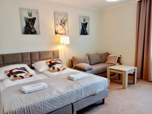 Postel nebo postele na pokoji v ubytování Willa Montis