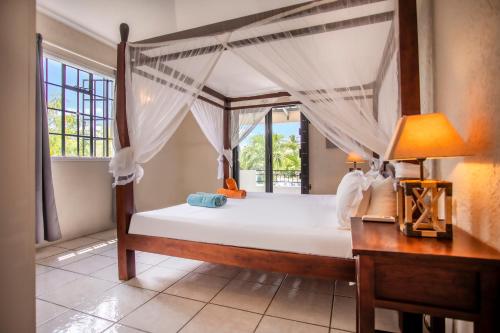 Postel nebo postele na pokoji v ubytování Villa Céleste - 4 Bedrooms in Central Tamarin