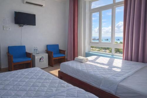 Postel nebo postele na pokoji v ubytování Thanh Tran Guesthouse Lý Sơn