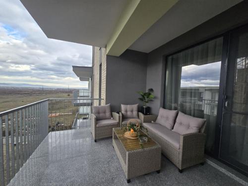 En balkon eller terrasse på Green Residence Rasnov