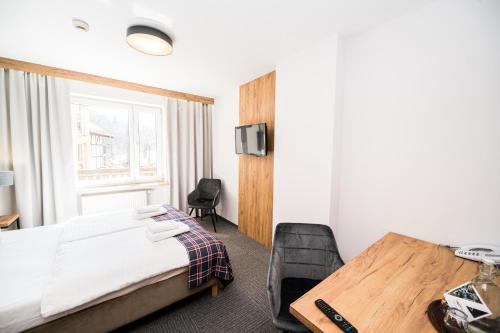 Postel nebo postele na pokoji v ubytování Nowa - Ski SPA Hotel