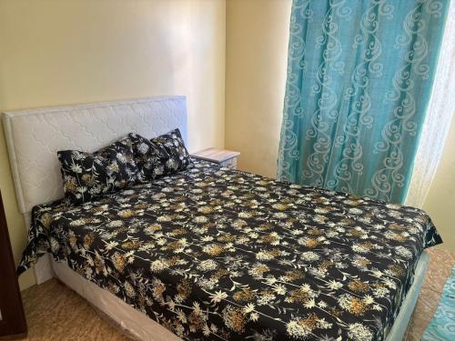 Giường trong phòng chung tại Cascade Retreat