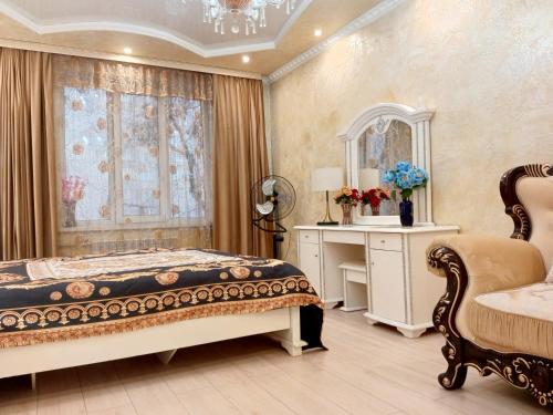 Postel nebo postele na pokoji v ubytování 3 Rooms of the Sun