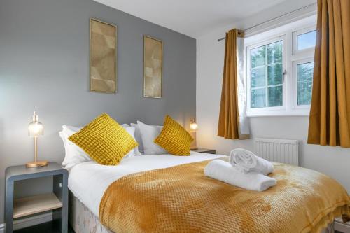 En eller flere senge i et værelse på CircleWay Homes - Colwick