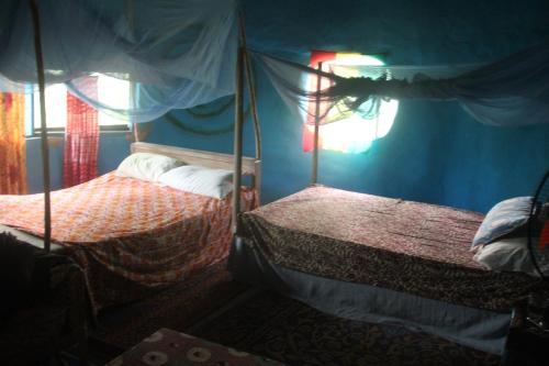 Cama o camas de una habitación en Green Zion Garden