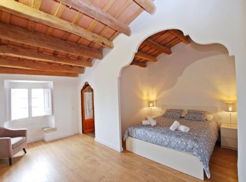 En eller flere senge i et værelse på The Painter's Home