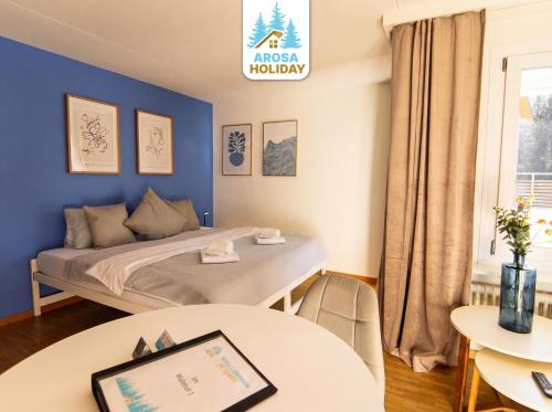 Ένα ή περισσότερα κρεβάτια σε δωμάτιο στο Waldhof 1 - Waldhof 4 by Arosa Holiday