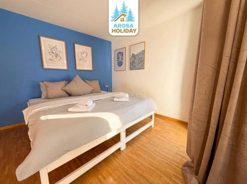 Ένα ή περισσότερα κρεβάτια σε δωμάτιο στο Waldhof 1 - Waldhof 4 by Arosa Holiday