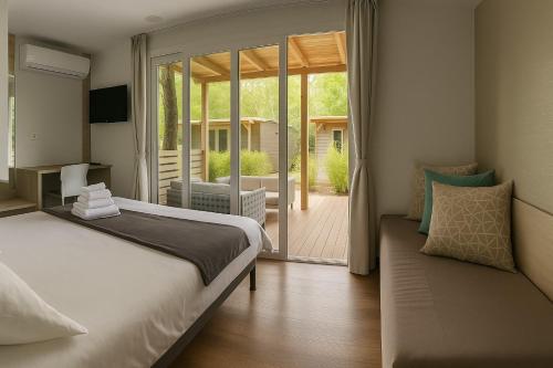 Postel nebo postele na pokoji v ubytování Boutique Mobile Homes UlikaRovinj