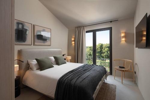 Postel nebo postele na pokoji v ubytování Villa Nija