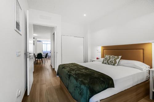 Postel nebo postele na pokoji v ubytování Taliarte Clavellinas