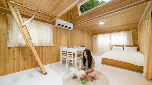 Giường trong phòng chung tại Gapyeong Soopia pension