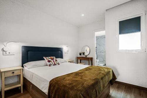 Postel nebo postele na pokoji v ubytování Taliarte Clavellinas