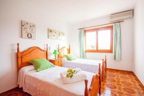 En eller flere senge i et værelse på Villa Puig den Valls 197