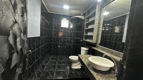 حمام في VERÃO ROOTs