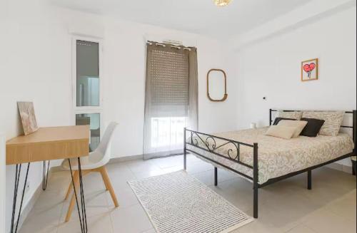 Giường trong phòng chung tại Super appartement avec piscine